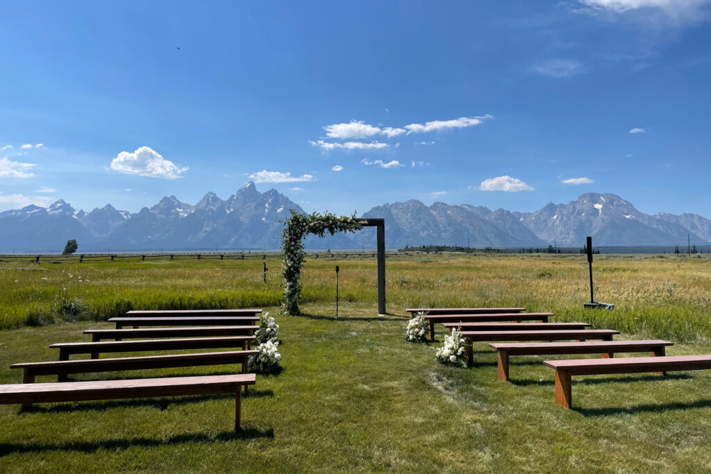 Wedding ceremony sound with Teton backdrop